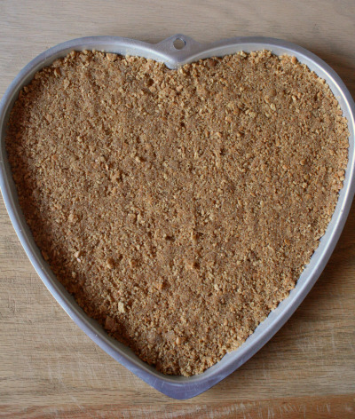graham cracker crust in heart shaped pie pan