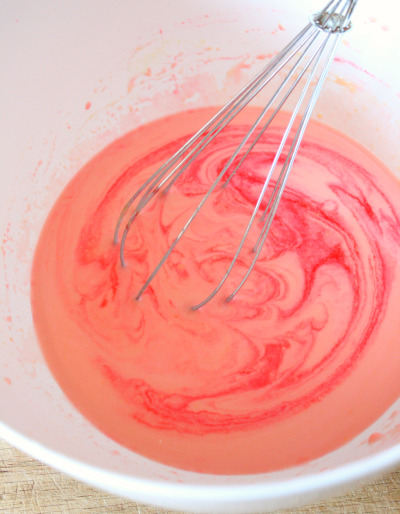 whisking pudding in a bowl
