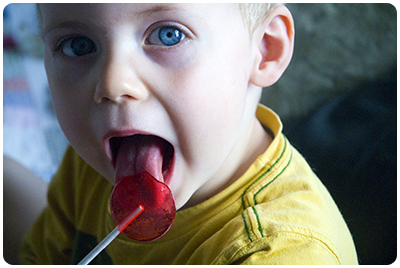 child eating a lollipop