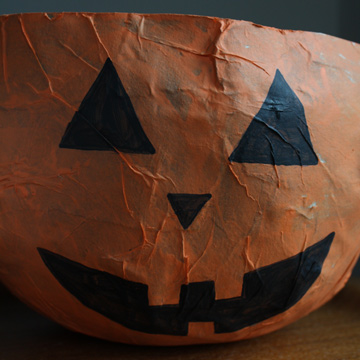 DIY Paper Bag Candy Bowls for Halloween (pumpkin shape) by Ellen Luckett Baker for Alphamom.com 