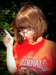 picture of a young girl wearing a St. Louis Cardinals t-shirt 