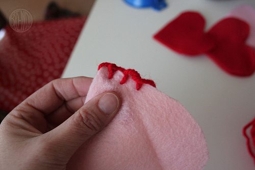 stitching felt hearts together 