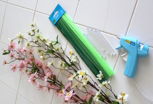 fake flowers, pipe cleaner , hot glue sticks and hot glue gun