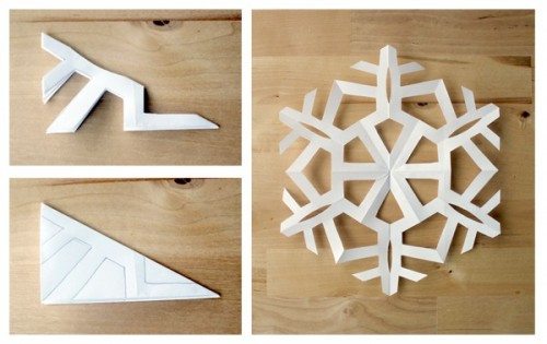 cutting paper snowflakes 