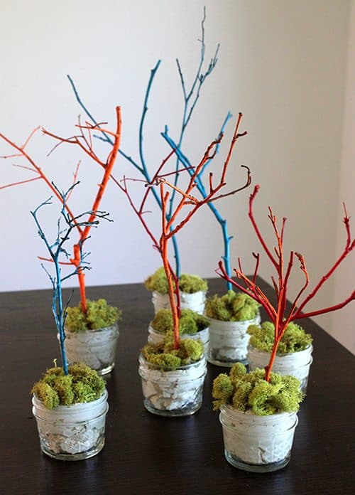 DIY mini Easter trees on a table