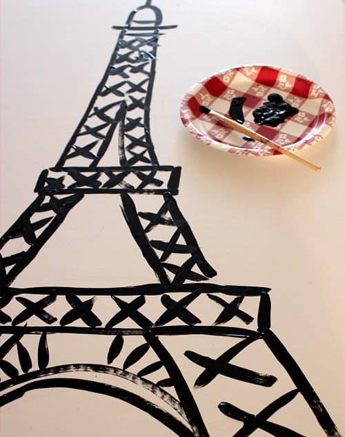 The Eiffel Tower painted onto cardboard
