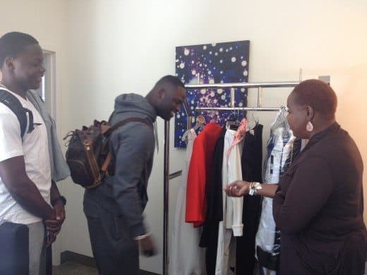 Rose Murphy and son Teddy Bridgewater choosing jewelry for outfit 