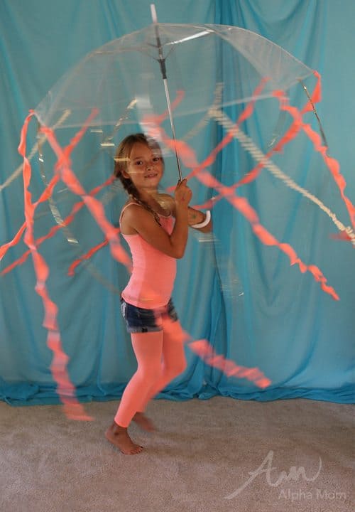 A girl wearing a Kids' Jellyfish Costume in motion 