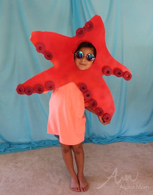 A girl wearing a Kids' Starfish Costume