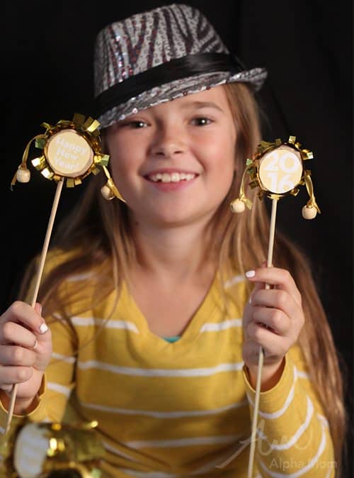 Child holding New Year Rattle Drums 