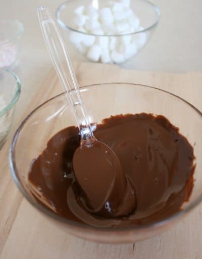 Plastic spoon dipped in chocolate 