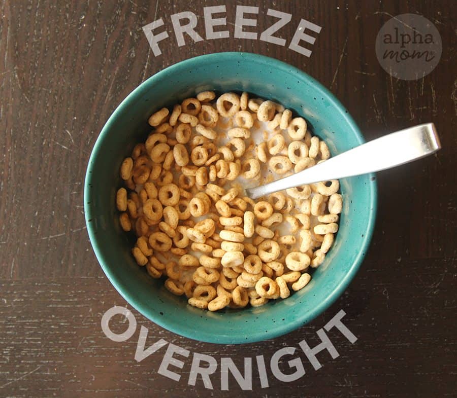 photo of Cheerios and milk with spoon in turquoise bowl and the words Freeze on top and Overnight on bottom of bowl 