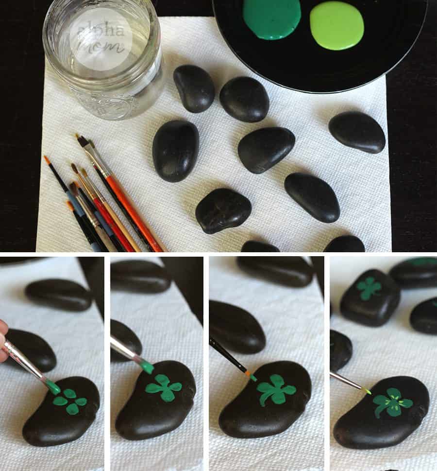 Stones, paint brushes and paint for decorating stones for St. Patrick's Day