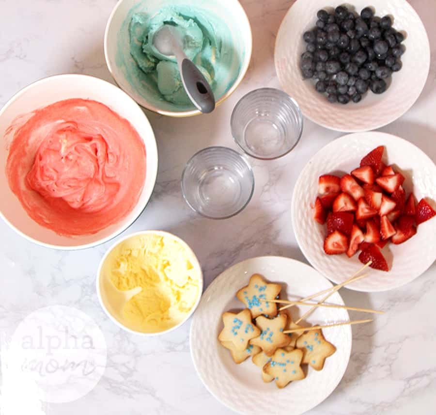 assembling patriotic ice cream with star cookies 