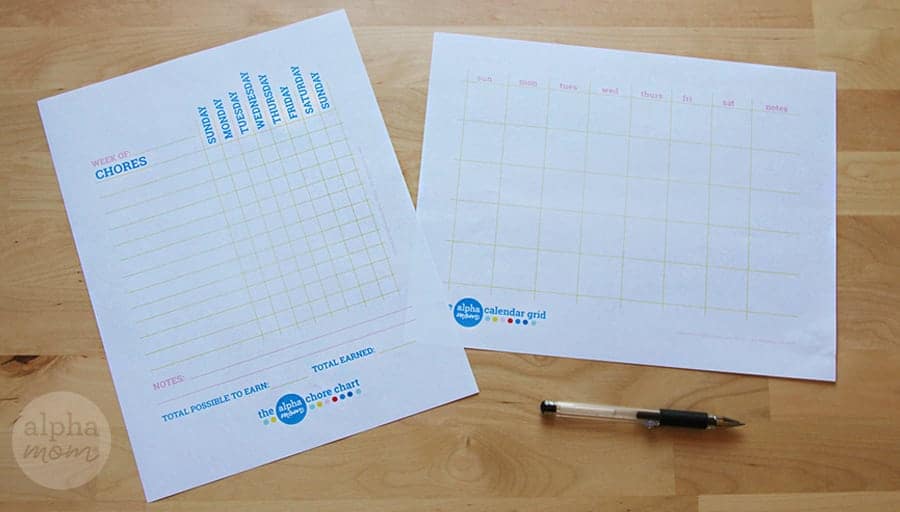 a chore chart and a family calendar printable laying on a table