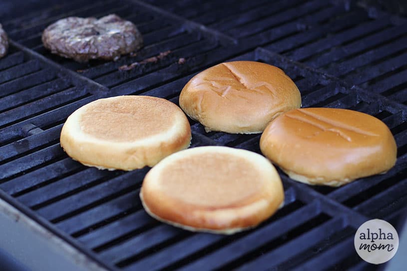 picture of hamburger buns on a grill