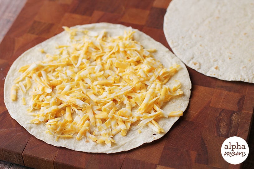 Uncooked quesadilla showing the amount of cheese to use