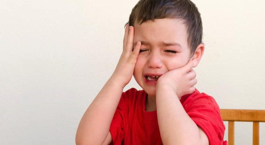 Portrait of unhappy, upset , crying child boy
