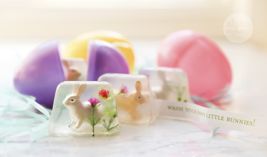 homemade bunny soaps in front of plastic Easter egg
